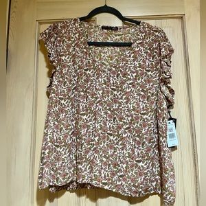 Women’s top size L. New with tags.